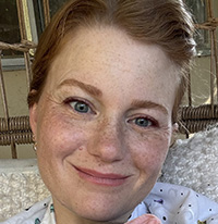 headshot photo of Caitlin Greene