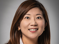 studio portrait headshot photo of Chiao-Ju Fang